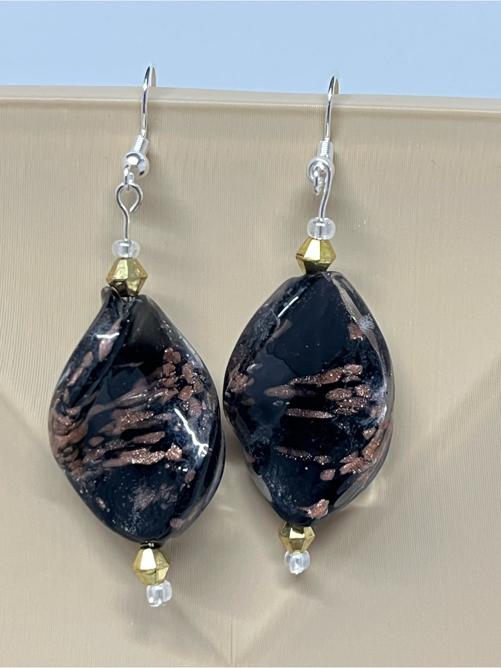 Hand Crafted Black Earrings with Rose Metallic Accents